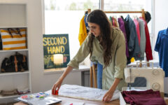 medium-shot-woman-repairing-clothes