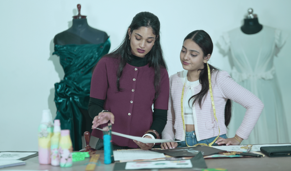 Fashion design students working on their project